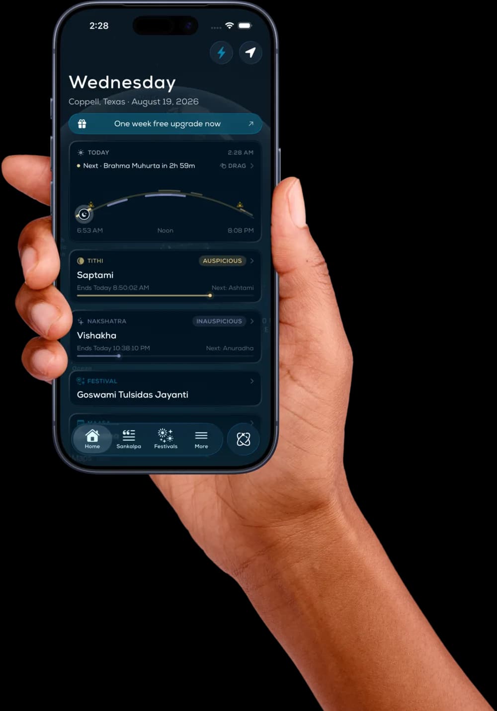 A hand holding an iPhone running MyPanchang